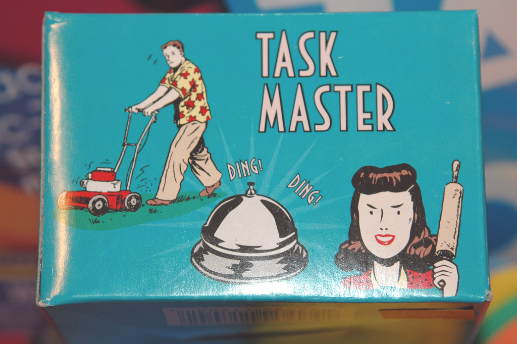 a board game called "task master" that depicts gender stereotypes of men and women