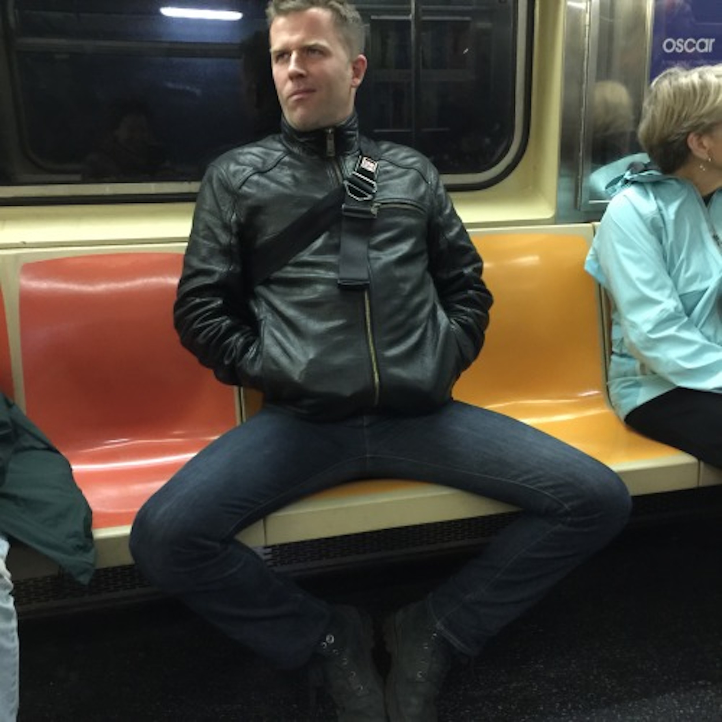 Manspreading with smirky face