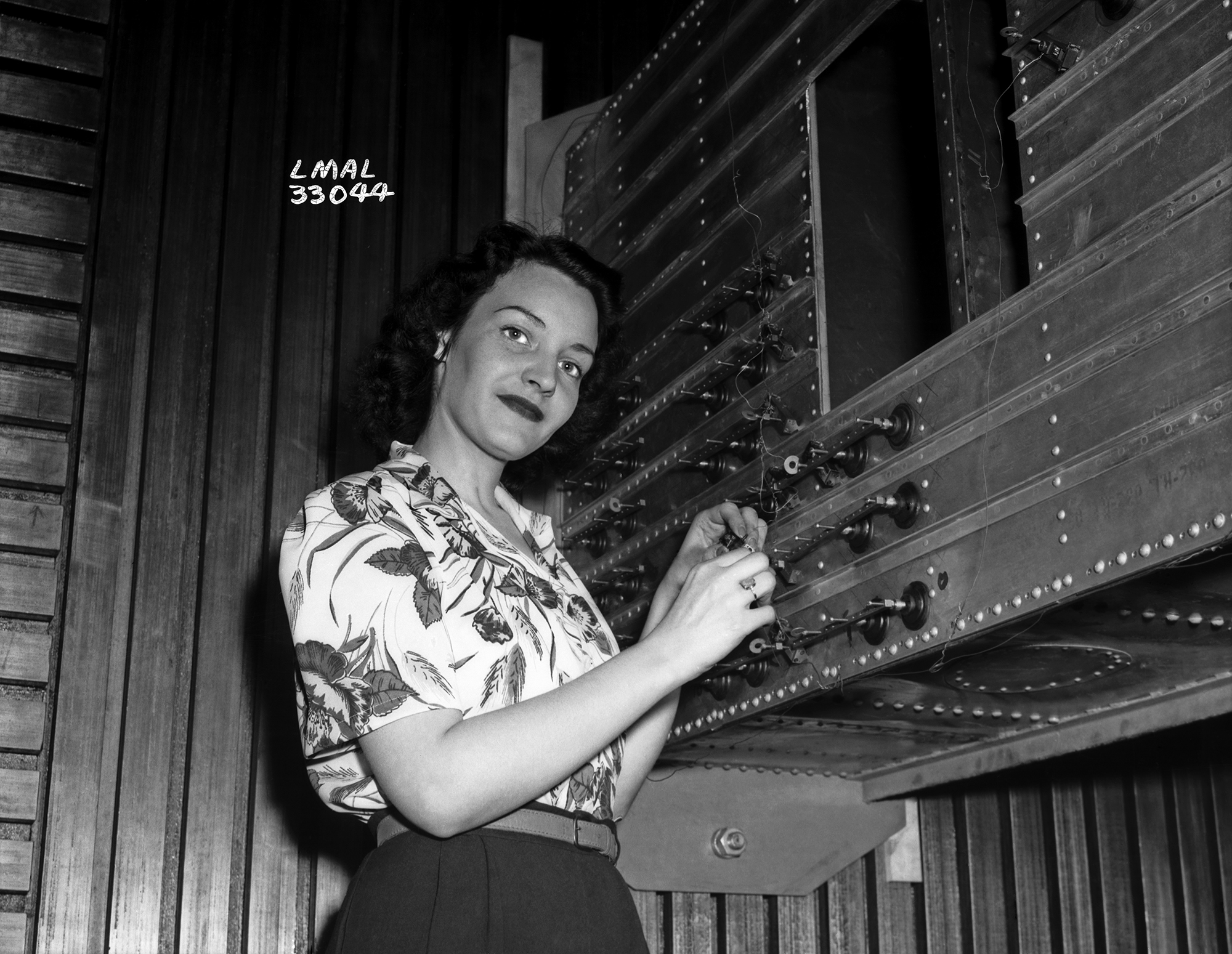 Woman working at Langley, 1943