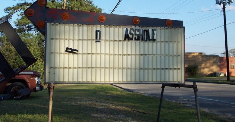 A sign that says "asshole"