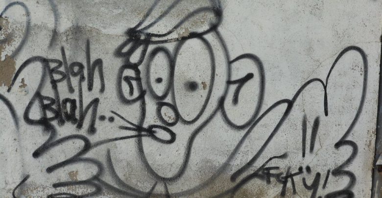 Graffiti of cartoon man saying blah blah blah