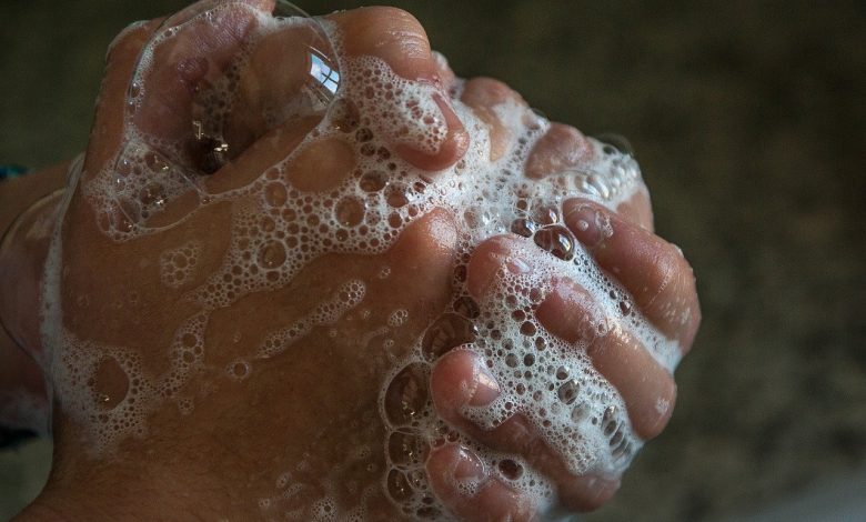 Hands with soap suds
