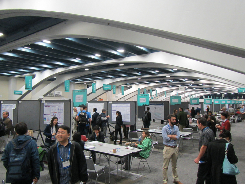 A tiny bit of the ginormous poster session, refreshed every day for five days. CC euphro on Flickr.